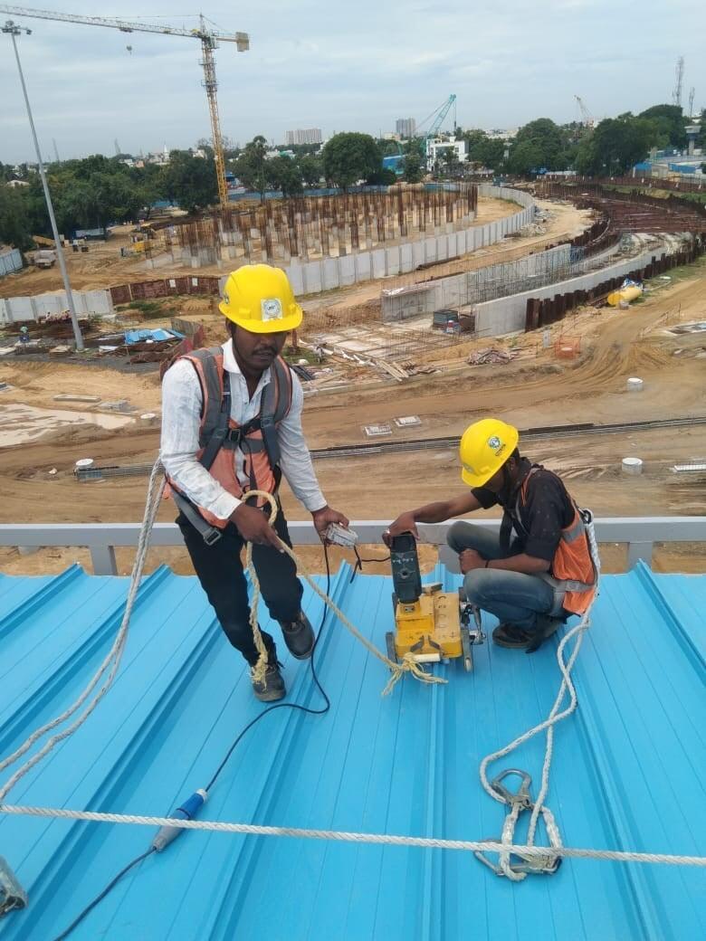 Architectural standing seam roofing for Lodha Mumbai: Premium metal building envelope featuring a minimalist aesthetic and hidden fastener technology by Rishonn & Reyansh.